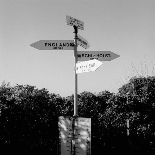 Signposts for England, Denmark and Zanzibar, Helgoland.